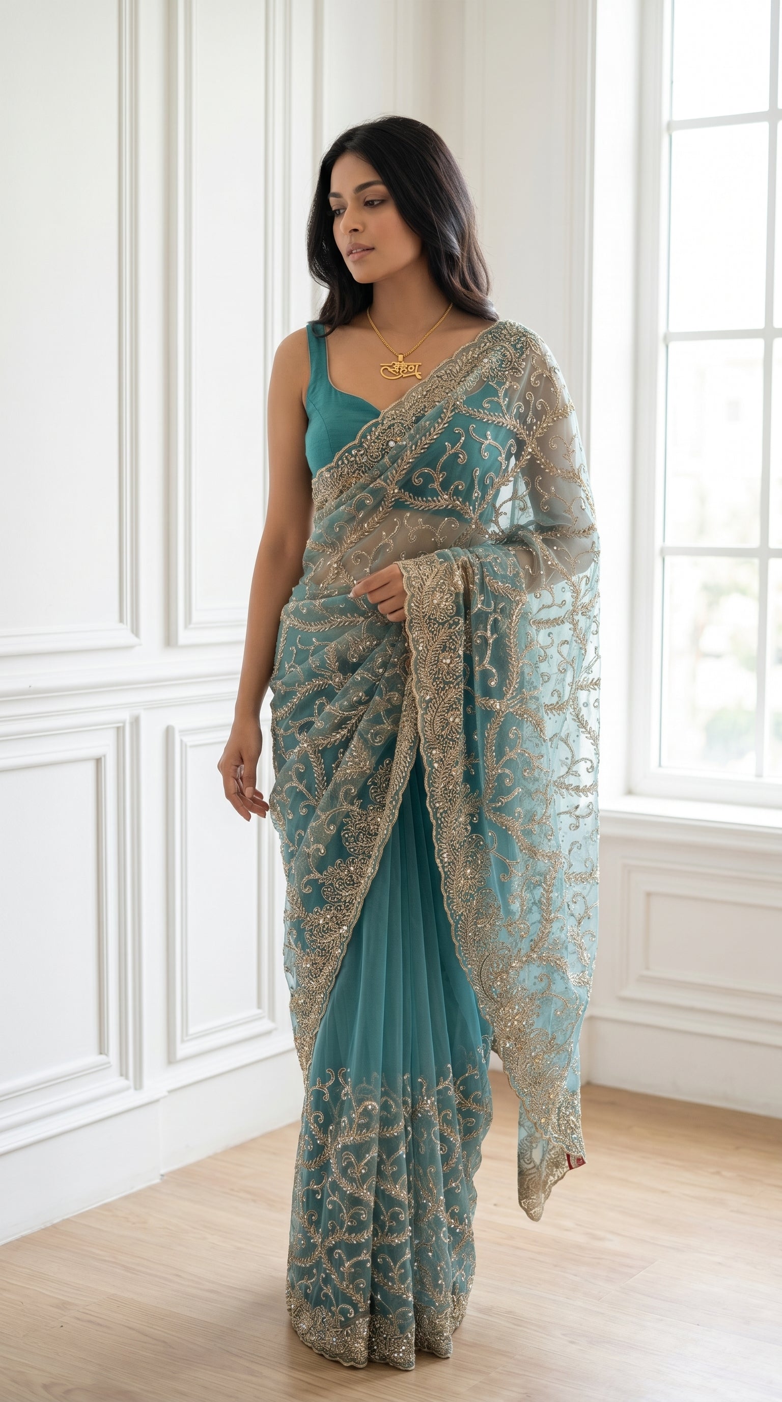 Teal Blue Gold Threadwork Net Saree